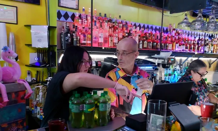 Jubilee staff working during an active bar service.